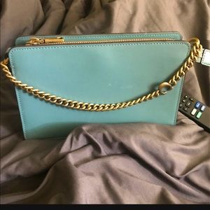 Small green coach purse